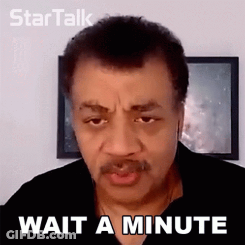 A Man With A Mustache Is Wearing Headphones And Making A Funny Face While Talking On A Video Call . GIF