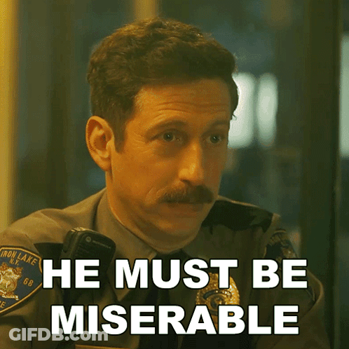 A Man With A Mustache Says He Must Be Miserable On A Screen GIF