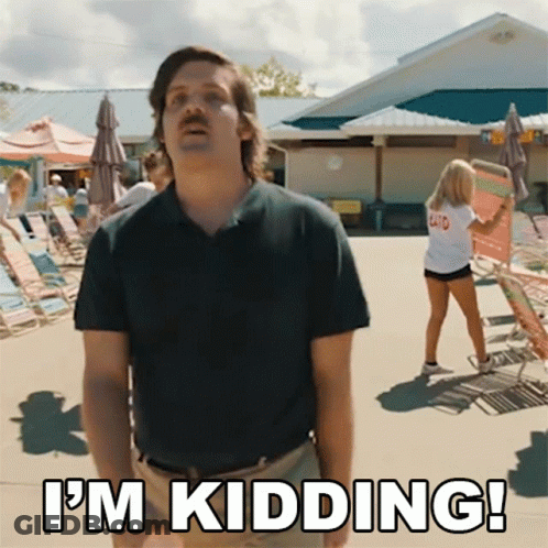 A Man With A Mustache Says I 'M Kidding While Standing In Front Of A Pool GIF