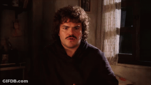 A Man With A Mustache Says " Let 'S Get Down To The Nitty Gritty " In Front Of A Window GIF