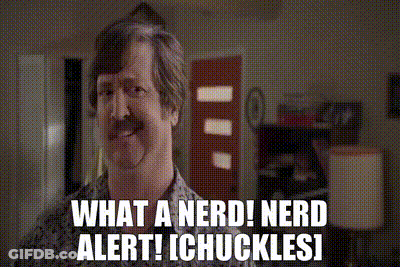 A Man With A Mustache Says " What A Nerd ! Nerd Alert ! Chuckles ! " GIF