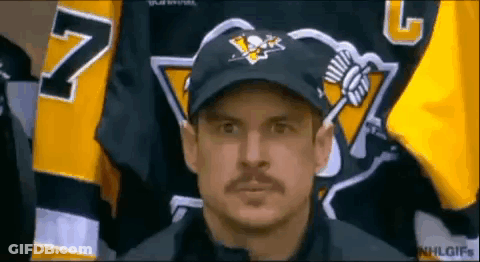 A Man With A Mustache Wearing A Hat And A Jersey With The Number 7 On It GIF