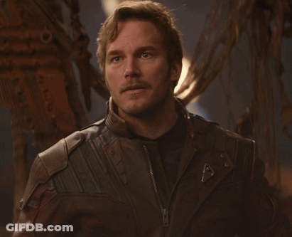 A Man With A Mustache Wearing A Leather Jacket With A Zipper GIF