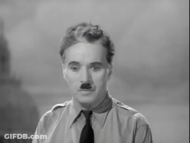 A Man With A Mustache Wearing A Shirt And Tie GIF