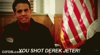 A Man With A Name Tag That Says Jimmy Is Sitting In Front Of An American Flag . GIF