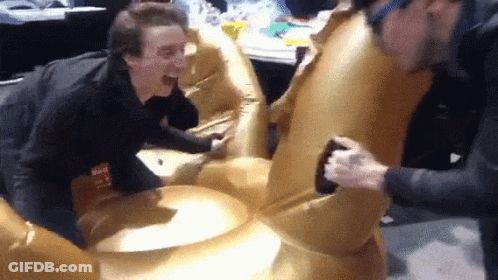 A Man With A Name Tag That Says ' Max ' On It Is Laughing GIF
