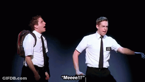 A Man With A Name Tag That Says " Meeeee " GIF