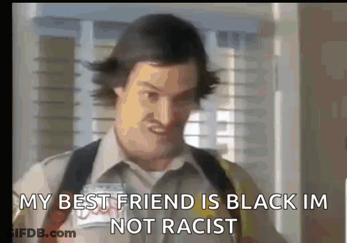A Man With A Name Tag That Says ' My Best Friend Is Black Im Not Racist ' GIF