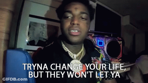 A Man With A Necklace On His Neck Says Tryna Change Your Life But They Won 'T Let Ya GIF