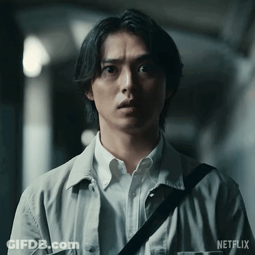 A Man With A Netflix Logo On His Sleeve GIF