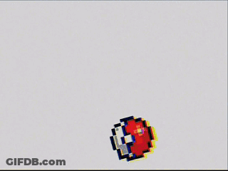 A Man With A Paper Bag On His Head Stands In Front Of A Red Wall GIF