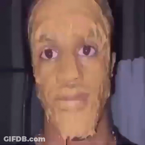 A Man With A Peanut Butter Mask On His Face . GIF