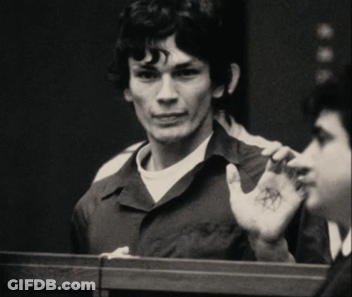 A Man With A Pentagram Tattoo On His Palm GIF