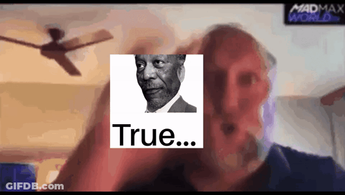 A Man With A Picture Of A Man And The Word True GIF