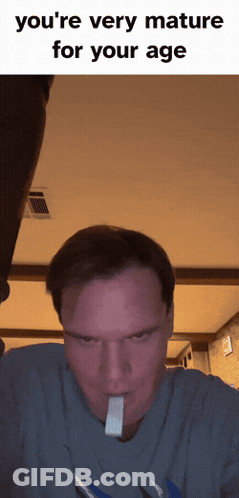 A Man With A Piece Of Gum In His Mouth And The Words You 'Re Very Mature For Your Age On The Bottom GIF