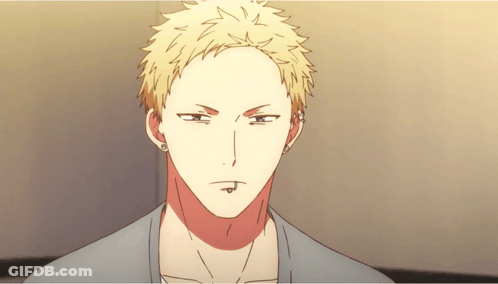 A Man With A Piercing In His Lip Looks Angry GIF