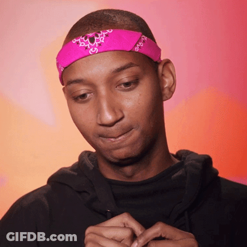 Man With Pink Bandana Looking Down GIF