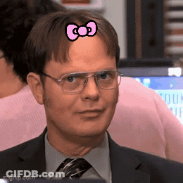 A Man With A Pink Bow On His Head GIF