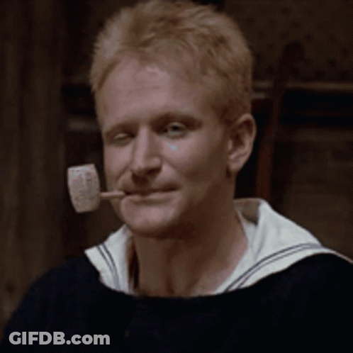 A Man With A Pipe In His Mouth That Says Popeye On It GIF
