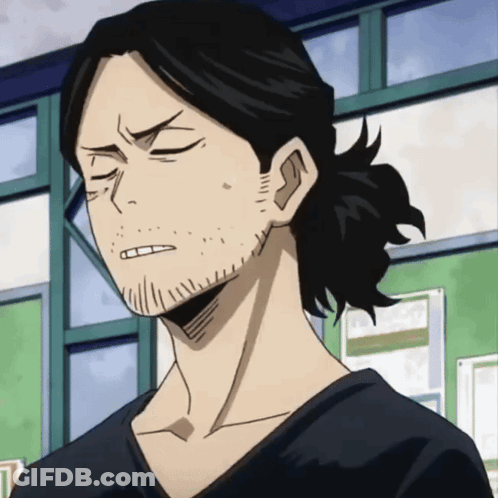 A Man With A Ponytail And A Beard Is Making A Face GIF