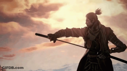 A Man With A Ponytail Is Holding A Sword And Pointing At Something GIF