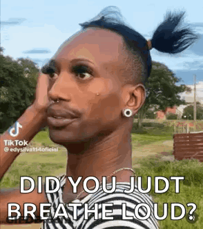 A Man With A Ponytail Is Wearing A Striped Shirt And Earrings And Says `` Did You Just Breathe Loud ? '' GIF