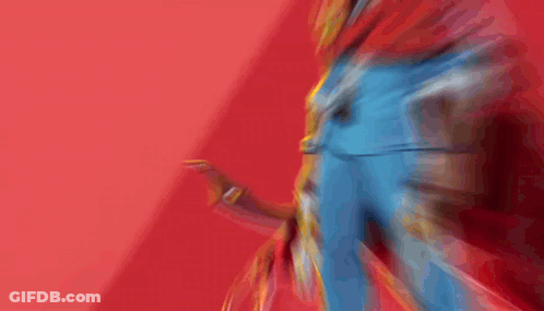 A Man With A Red Cape Is Holding A Gun In Front Of A Red Background GIF