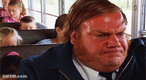 A Man With A Red Face Is On A School Bus GIF