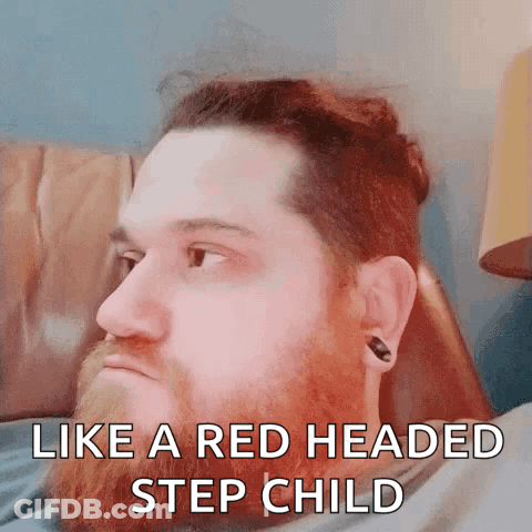 A Man With A Red Headed Step Child Caption On His Face GIF
