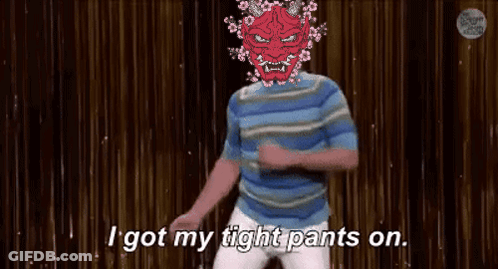 A Man With A Red Mask On His Head Is Dancing On A Stage And Says `` I Got My Tight Pants On '' . GIF