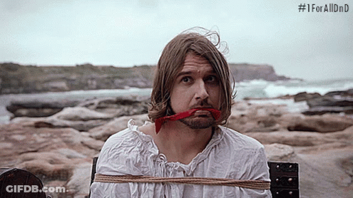 A Man With A Red Ribbon In His Mouth Is Tied To A Wooden Post With # 1Foralldnd Written On The Bottom GIF