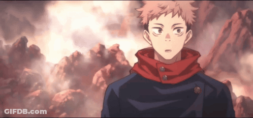 A Man With A Red Scarf Around His Neck Stands In Front Of A Mountain Range GIF