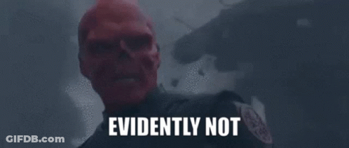 A Man With A Red Skull On His Face Is Standing In Front Of A Building With The Words Evidently Not Written On It . GIF