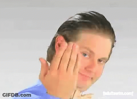 A Man With A Ring On His Finger Is Making A Funny Face GIF