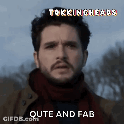 A Man With A Scarf Around His Neck And The Words Quite And Fab GIF