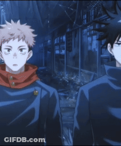A Man With A Scarf Around His Neck Is Giving A Thumbs Up Sign GIF