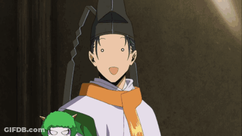 A Man With A Scarf Around His Neck Is Standing Next To A Woman With A Crown On Her Head GIF
