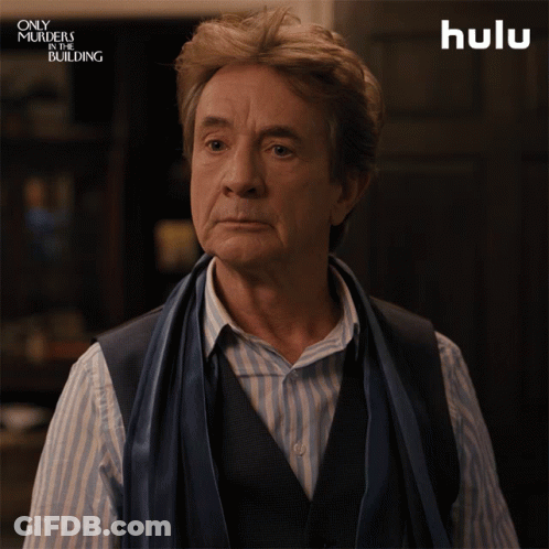 A Man With A Scarf Around His Neck Says The Word True GIF