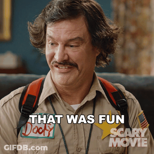 A Man With A Scary Movie Sticker On His Shirt Says That Was Fun GIF