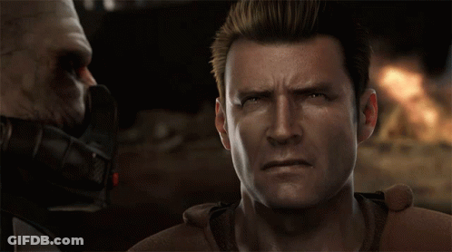 A Man With A Serious Look On His Face Looks At Another Man GIF