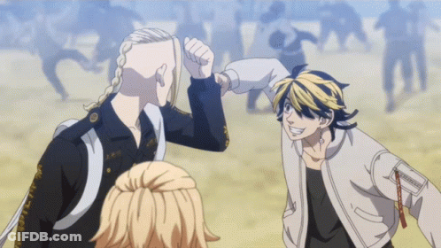 A Man With A Shaved Head Gives Another Man A Fist Bump GIF