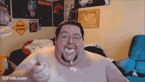 A Man With A Sign That Says Man Cave In The Background GIF