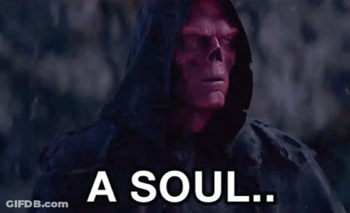 A Man With A Skull On His Face And The Words `` For A Soul '' Written Below Him . GIF