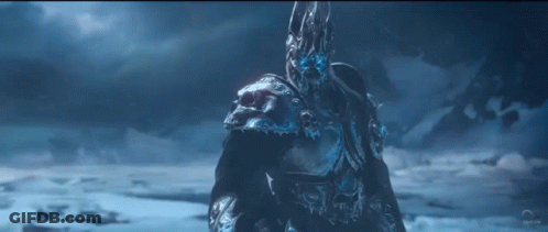 A Man With A Skull On His Head Is Standing In The Snow GIF