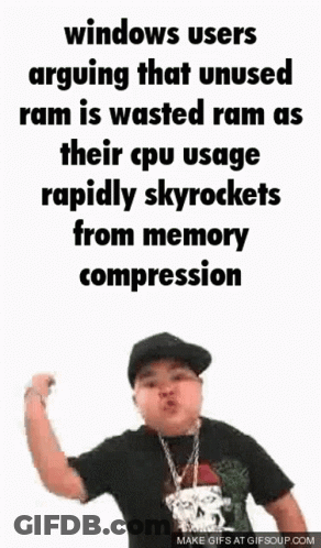 A Man With A Skull On His Shirt Is Making A Funny Face While Holding His Fist Up . GIF