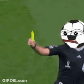 A Man With A Soccer Ball Head Is Holding A Yellow Card . GIF