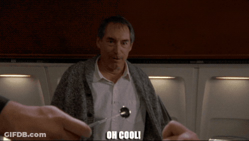 A Man With A Spoon In His Shirt Is Being Held By Someone With The Words Oh Cooli Written On The Bottom GIF