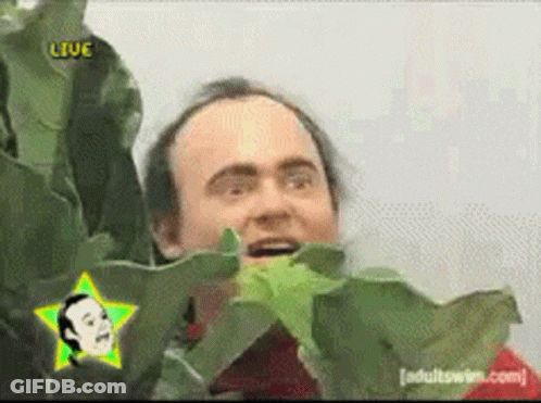 A Man With A Star On His Head And The Word Live On The Bottom GIF