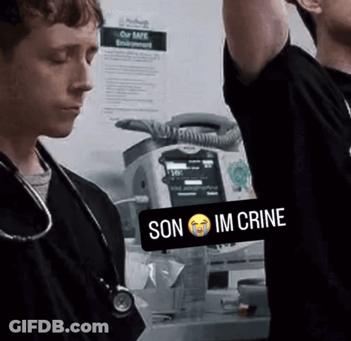 A Man With A Stethoscope Around His Neck Has A Son Im Crine Sticker On His Chest GIF