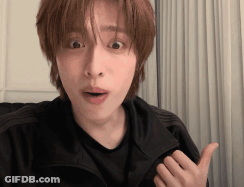A Man With A Surprised Look On His Face GIF